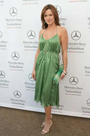 Danneel Ackles posing confidently with a smile