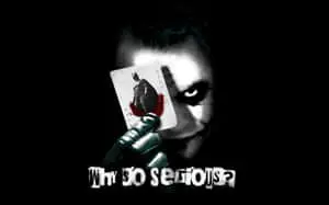 Joker Holding a Card with a Why So Serious Quote