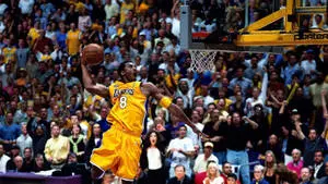 The legendary Kobe Bryant showing off his signature dunk move