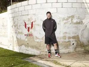 Lionel Messi With Messi Logo 